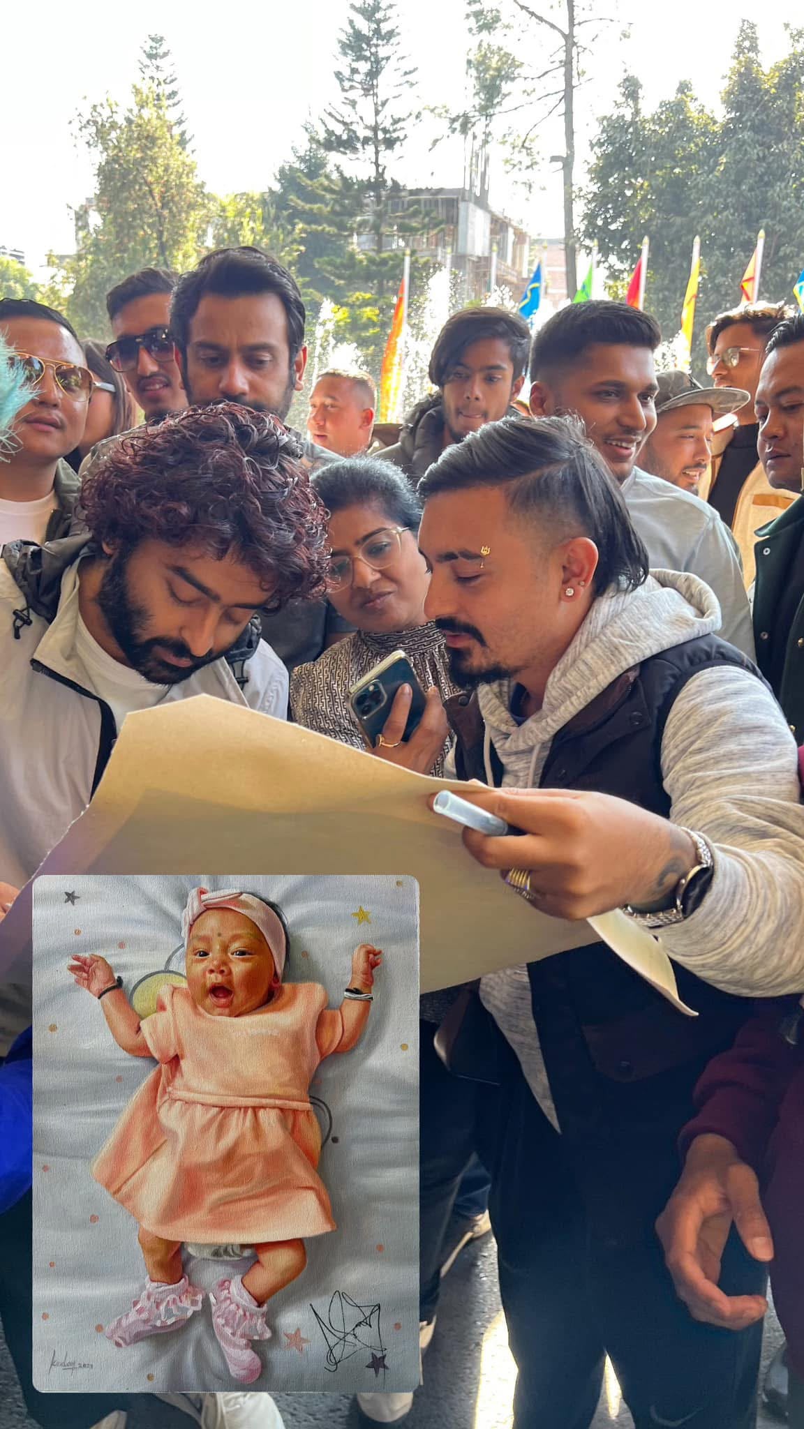 Fan artwork handed to an artist at a meet, Kathmandu